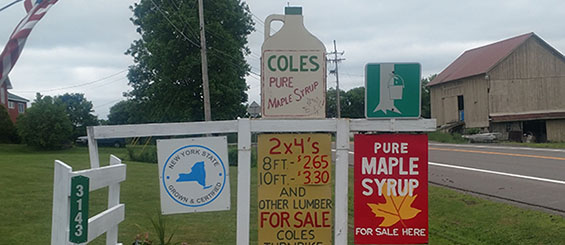 road sign for maple syrup